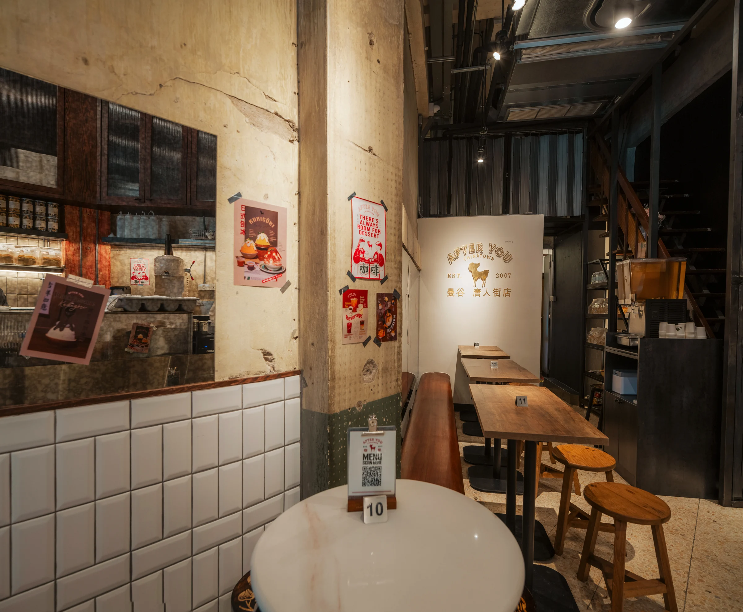 Wall graphics and compact seating at After You Chinatown