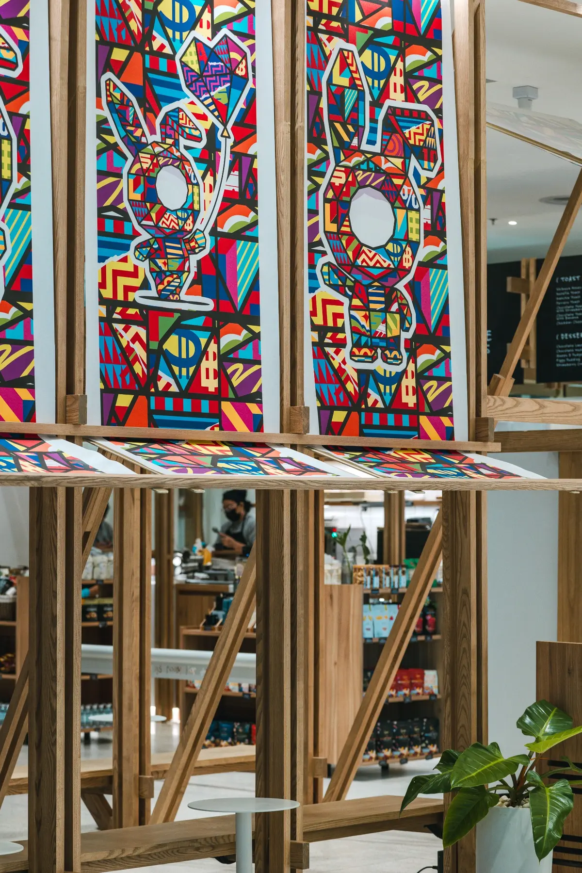 Rukkit Satapornvajana artwork within the cafe interior