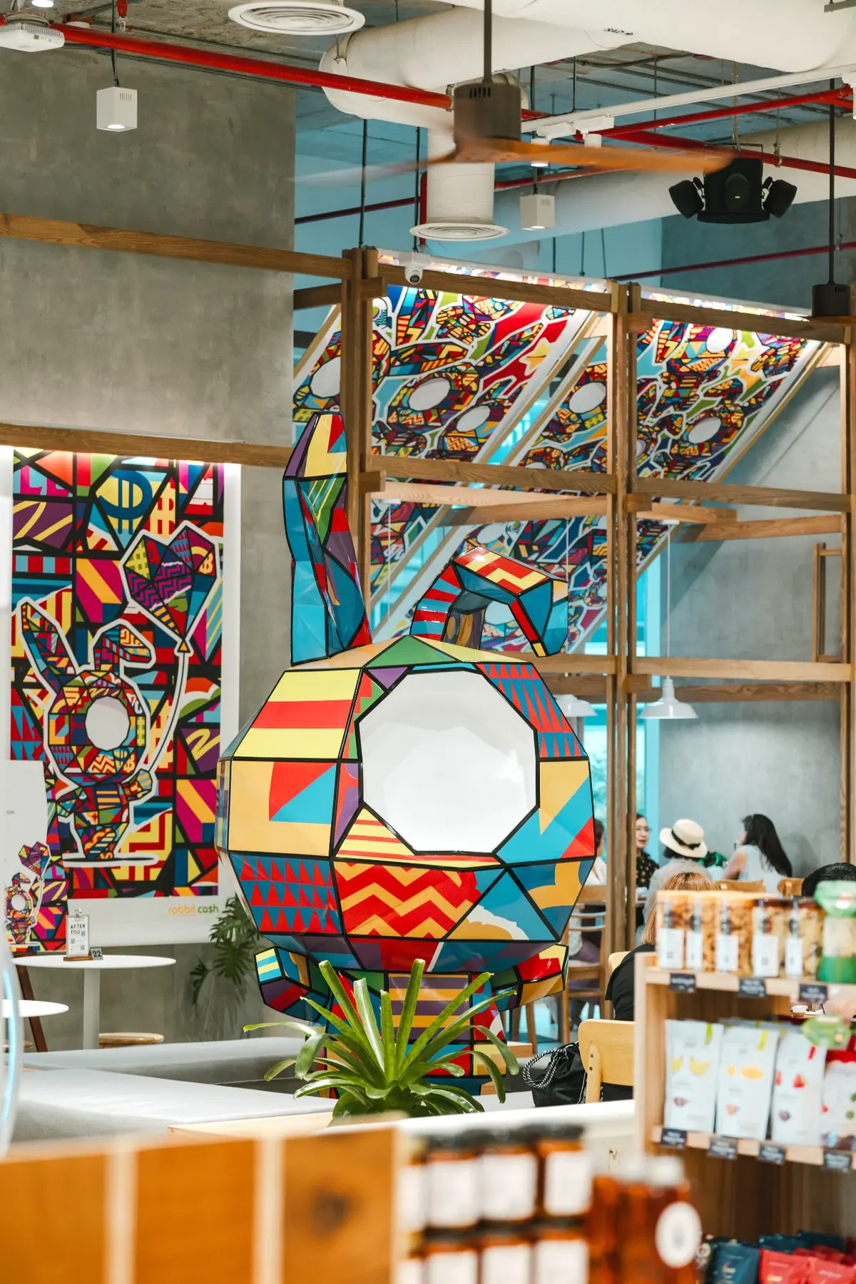Sculpture and painted panels integrated with retail displays