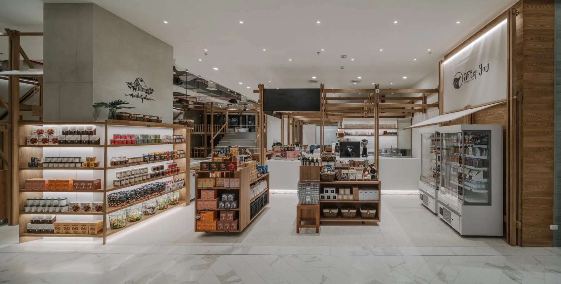 Retail marketplace and cafe counter at After You Unicorn Building