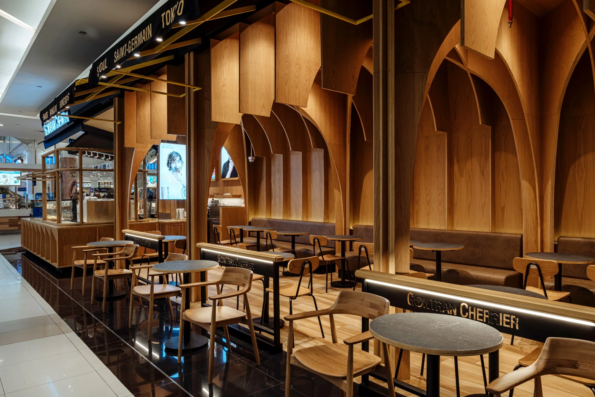Custom yellow furniture detail inside Gontran Cherrier Bangkok