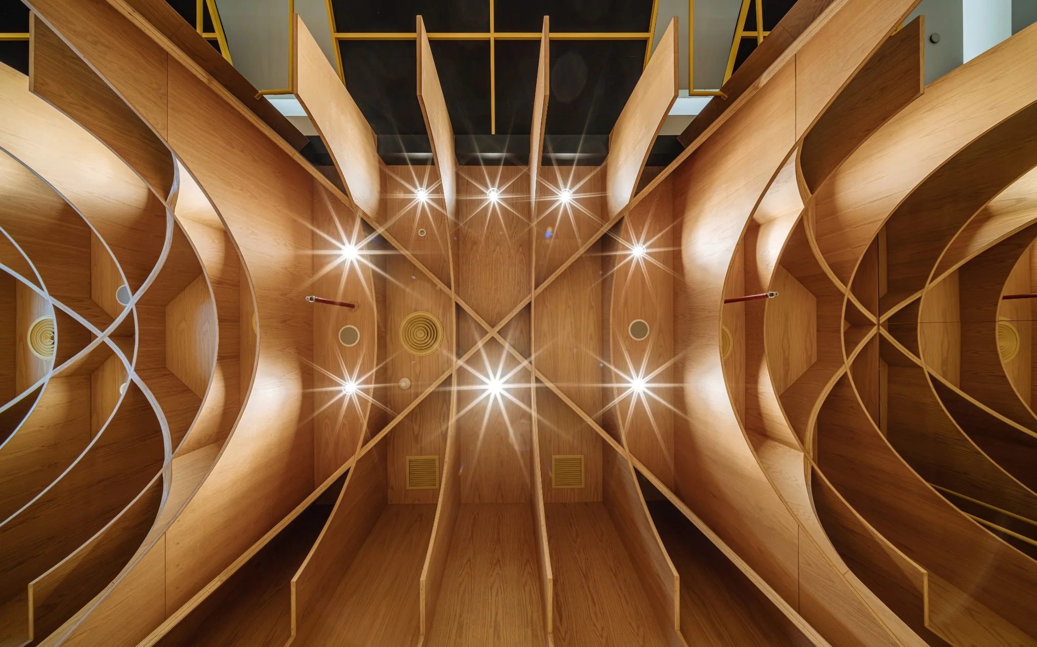View through the cafe seating and timber arch sequence