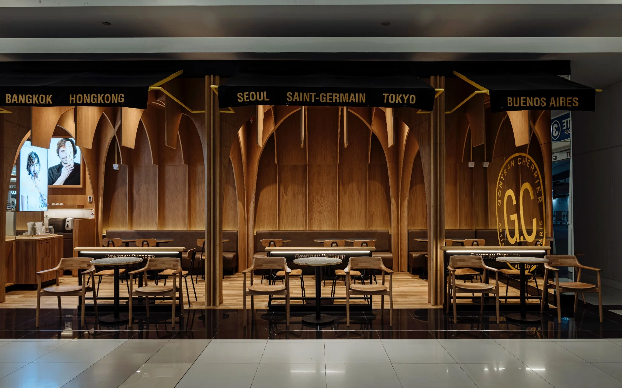 Perspective across the bakery interior and seating area
