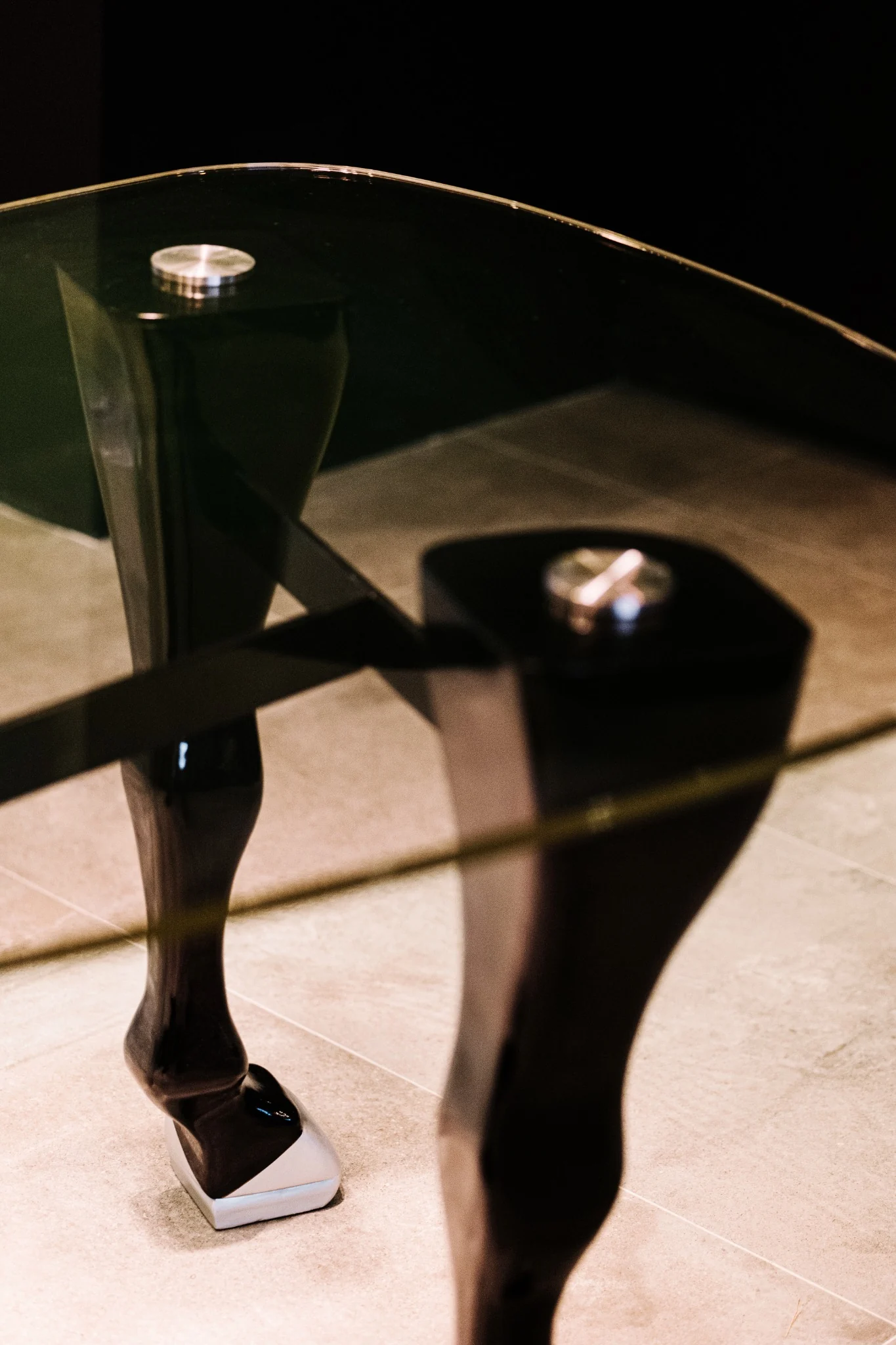 Black glass display cabinet detail at Indy's Scape