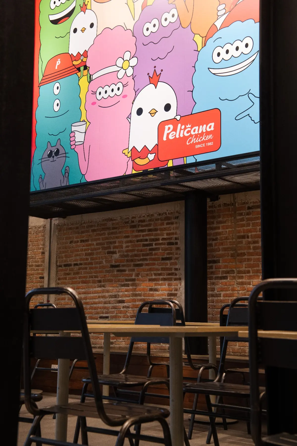 Close view of illustrated Pelicana character artwork