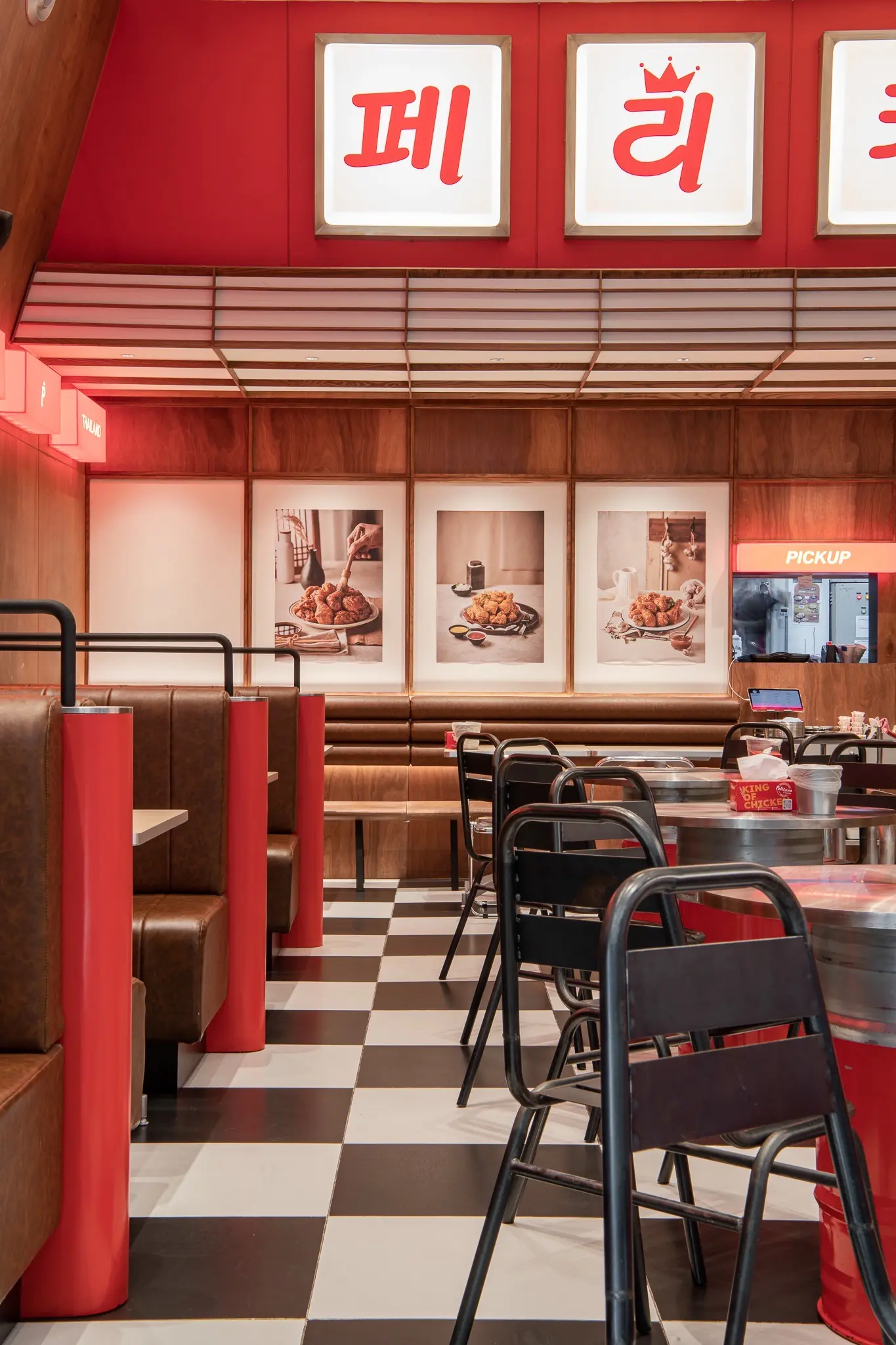 Pelicana WestGate checkerboard aisle and wall seating