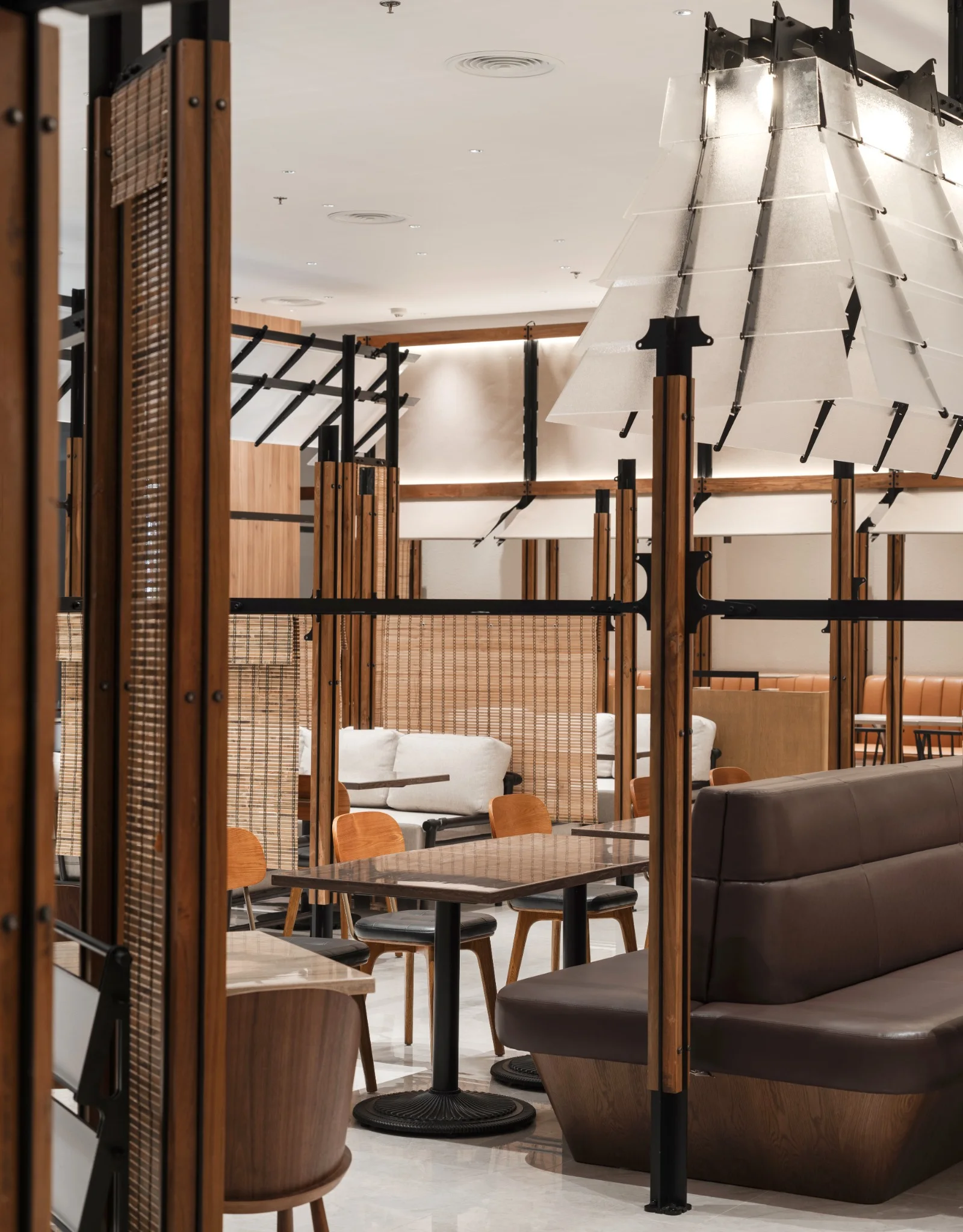 Layered frame, timber posts and seating at Ponn Future Park Rangsit