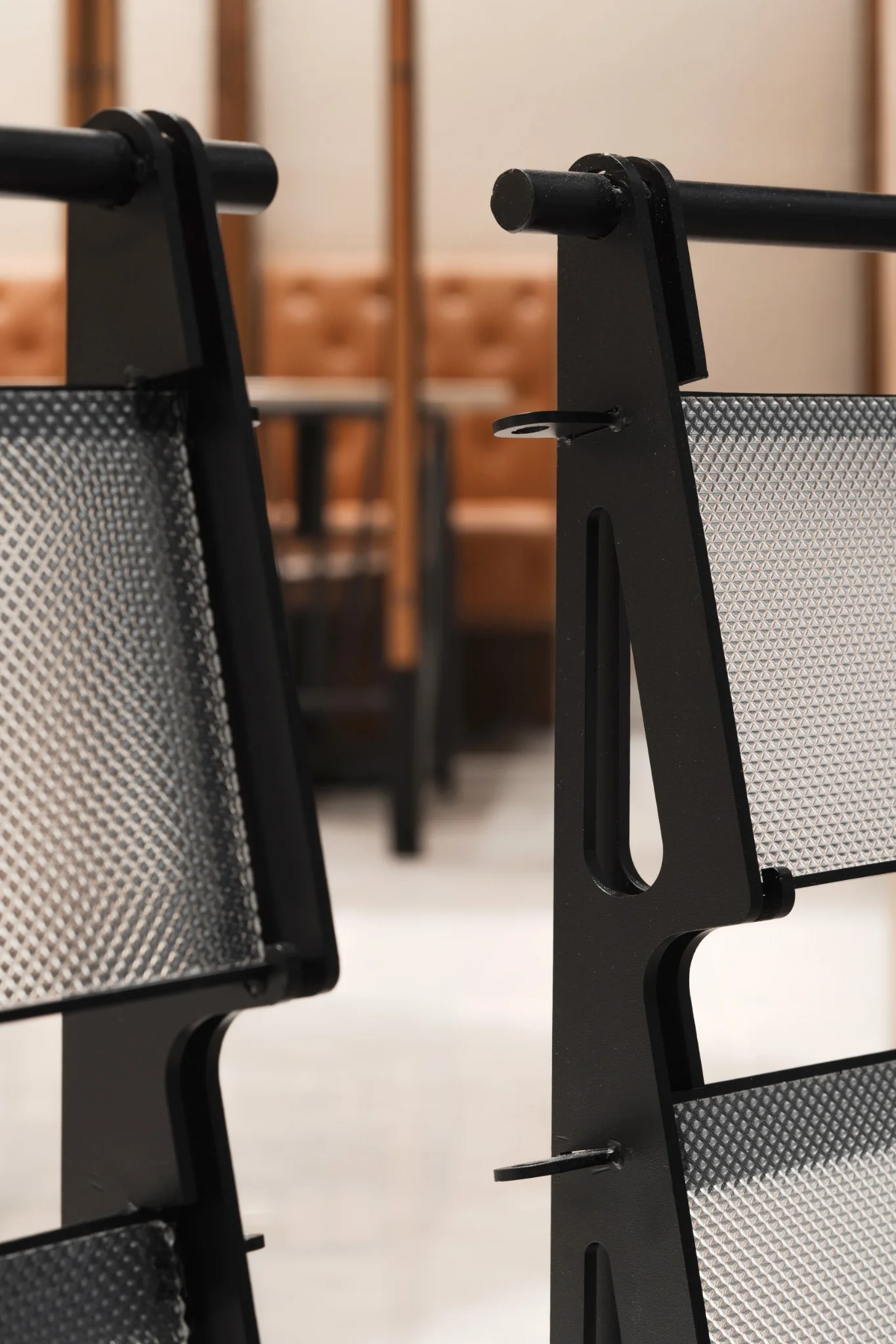 Custom black metal screen support and textured translucent panel at Ponn Future Park Rangsit