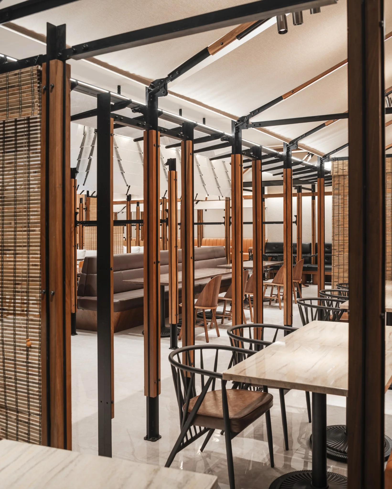 Vertical frame and dining area detail at Ponn Future Park Rangsit