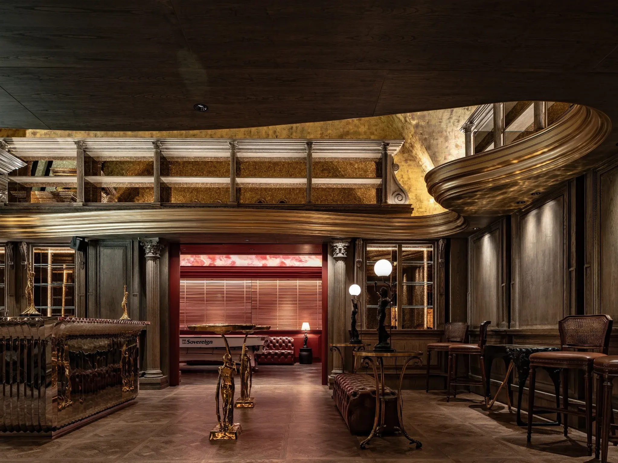 Private lounge seating and custom furniture inside The Club