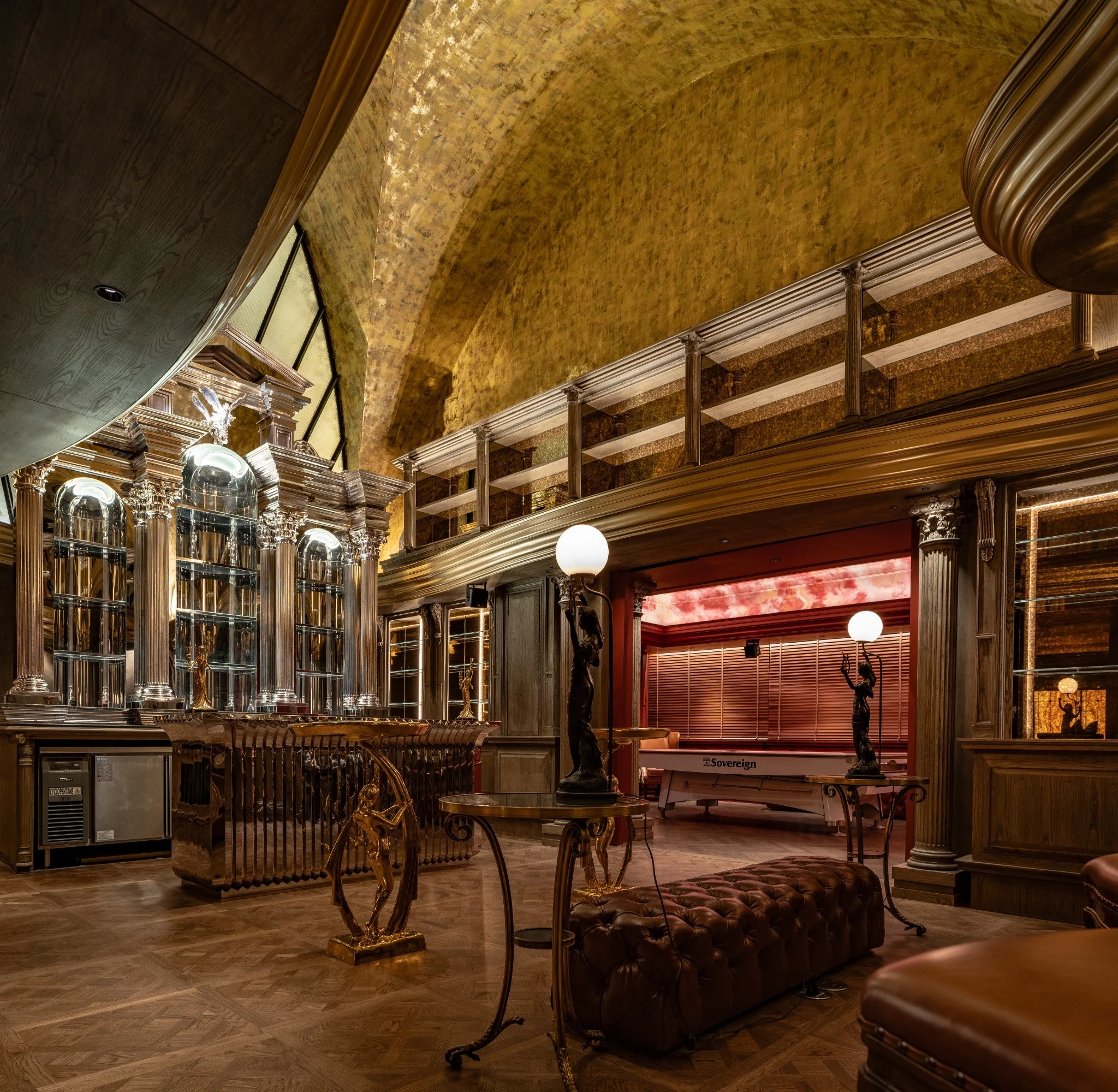 Curved architectural detail and warm lighting in The Club