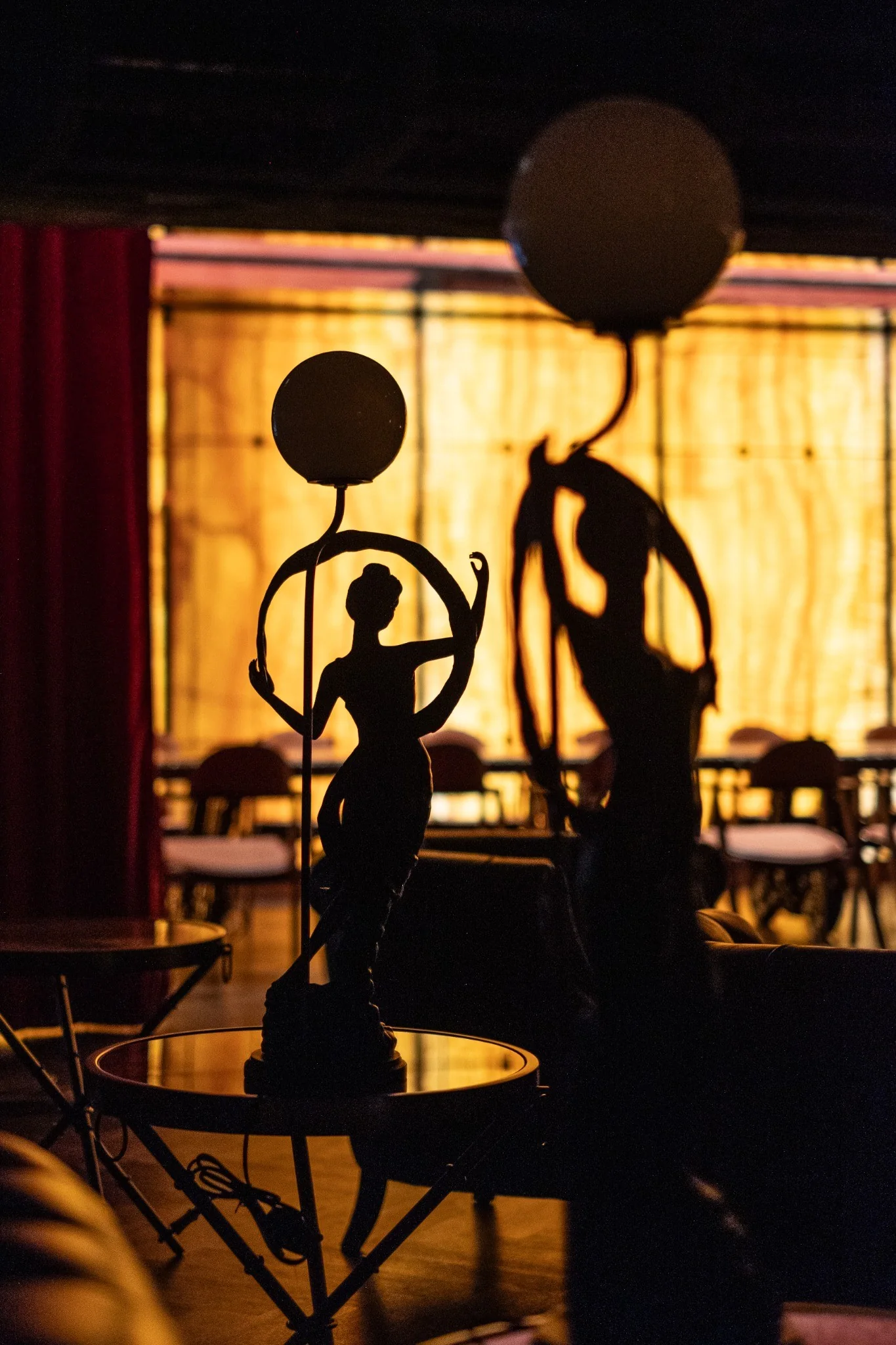 Custom table and seating composition inside The Club