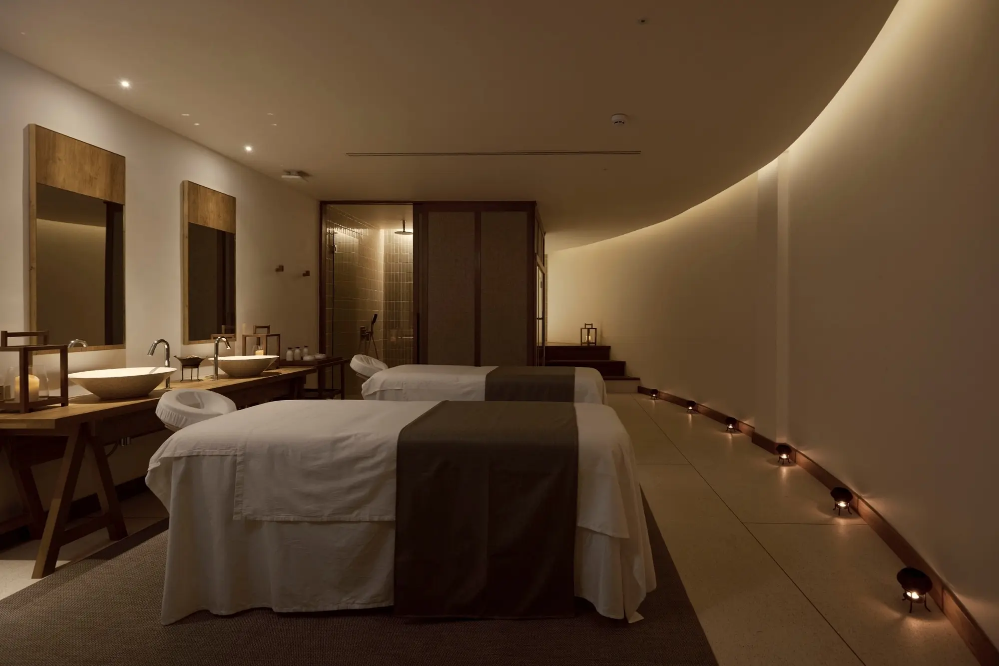 Curved lighting in treatment room at The Retreat Spa