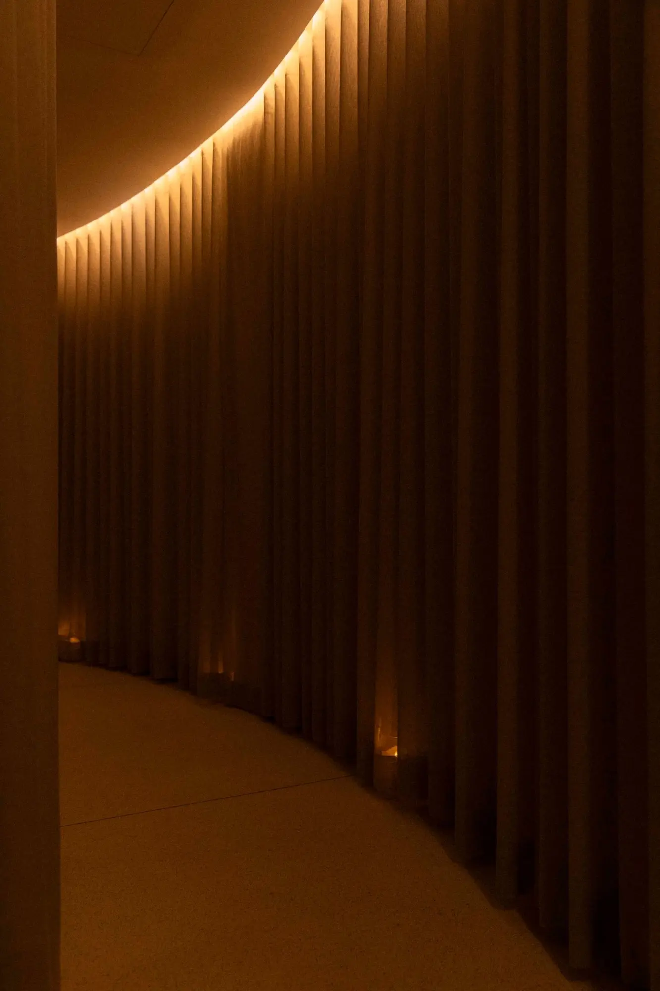 Curved curtain and concealed lighting at The Retreat Spa