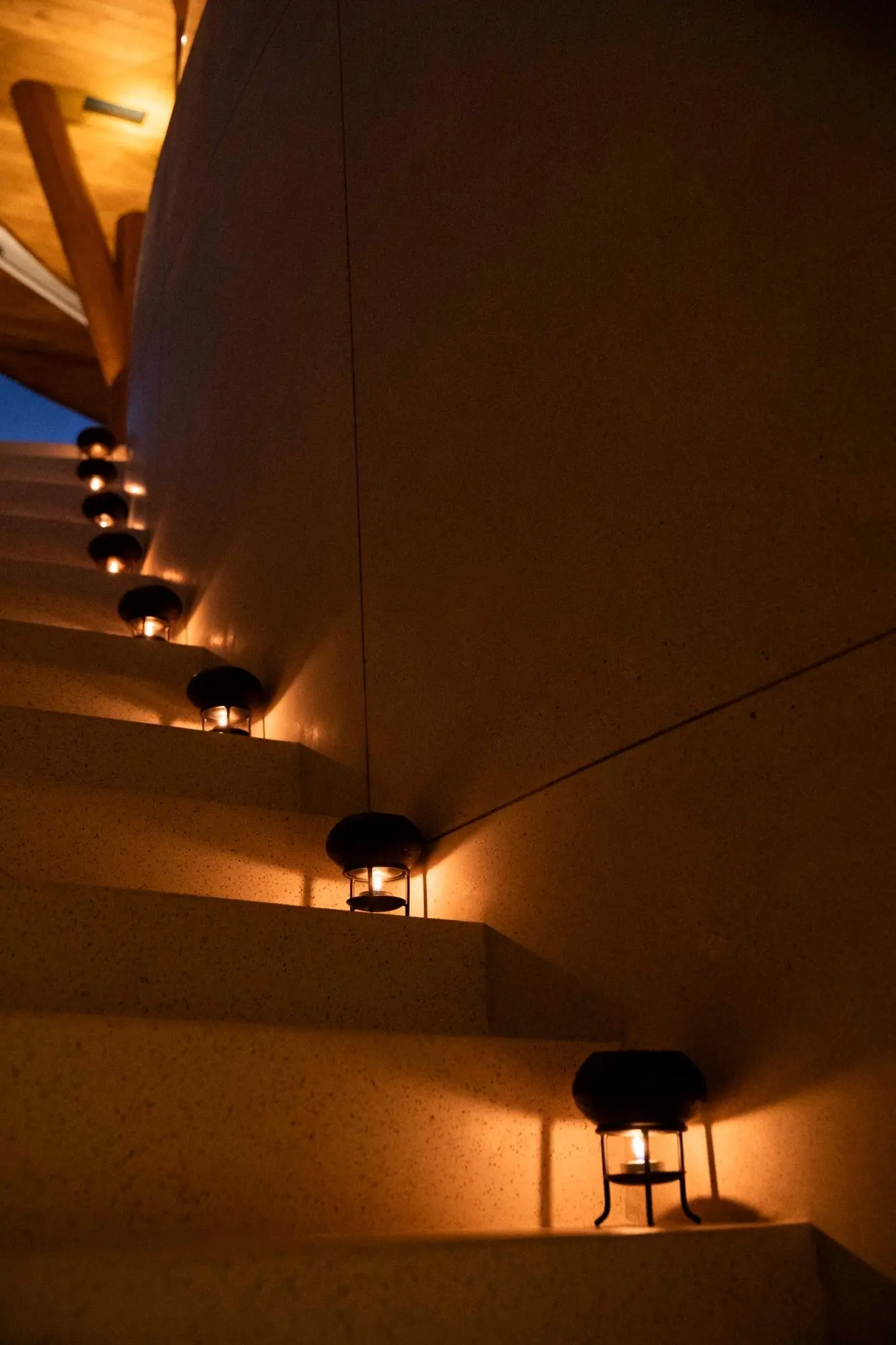 Spa stair lighting and curved wall detail